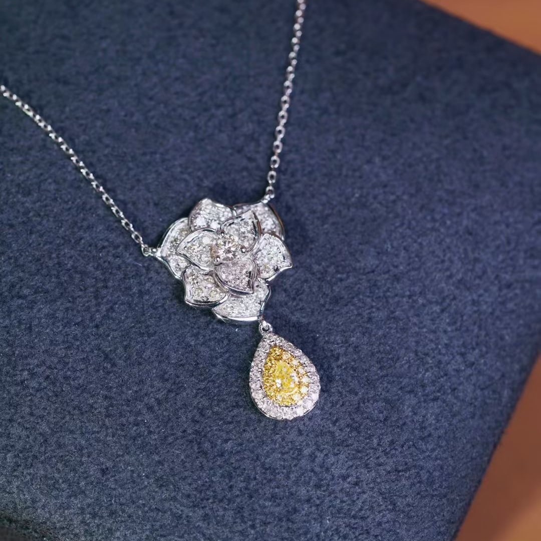 14k Gold 0.75 Ctw Natural Yellow Diamond & Diamond Necklace: Ref:231044372 // gold content:14k gold // main gemstone:yellow diamond // shape:pear // carat weight:0. 12ct // color:yellow // treatment:natural // // adjacent gemstone 2 : diamond // shape:round //