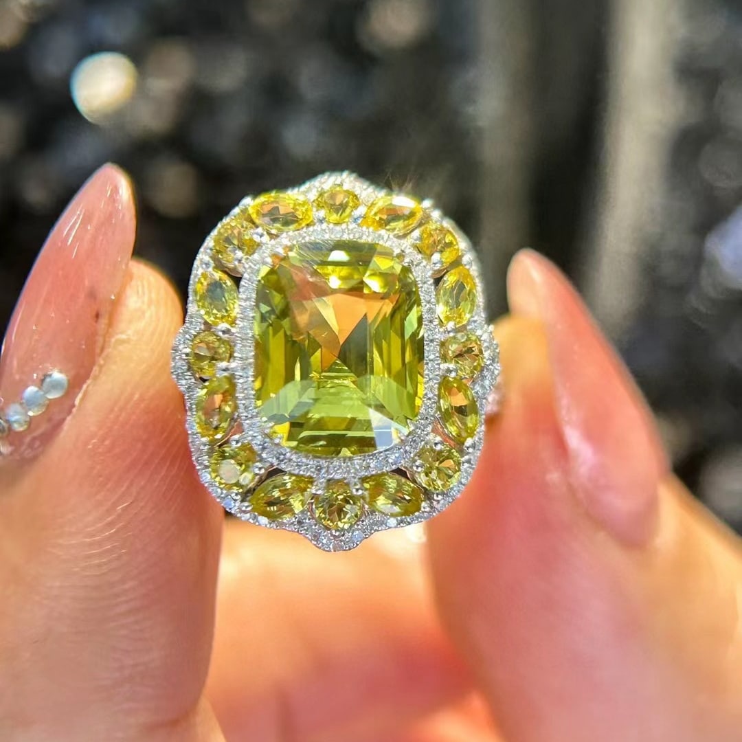 14k Gold 5.19 Ctw Natural Chrysoberyl & Diamond Ring: Ref:231044379 // gold content:14k gold // ring size:7. 25us // // main gemstone:chrysoberyl // shape:cushion // carat weight:4. 57ct // color:yellow // treatment:natural // // adjacent gemstone 2 :