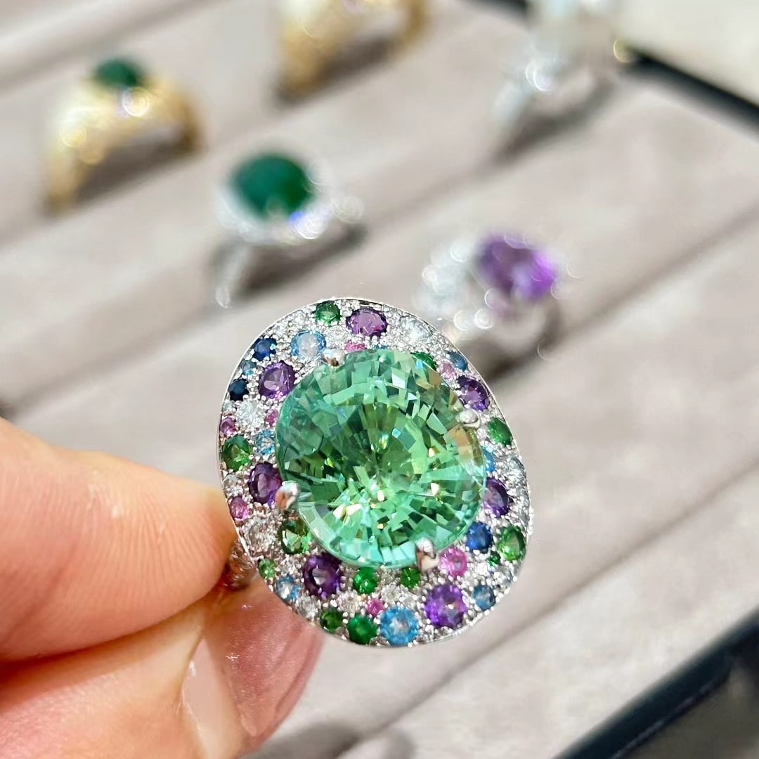 14k Gold 9.15 Ct Natural Tourmaline & Diamond Ring: Ref:231044421 // gold content:14k gold // ring size:7. 25us // // main gemstone:tourmaline // shape:oval // carat weight:9. 15ct // color:green // treatment:natural // // adjacent gemstone 2 : diamond