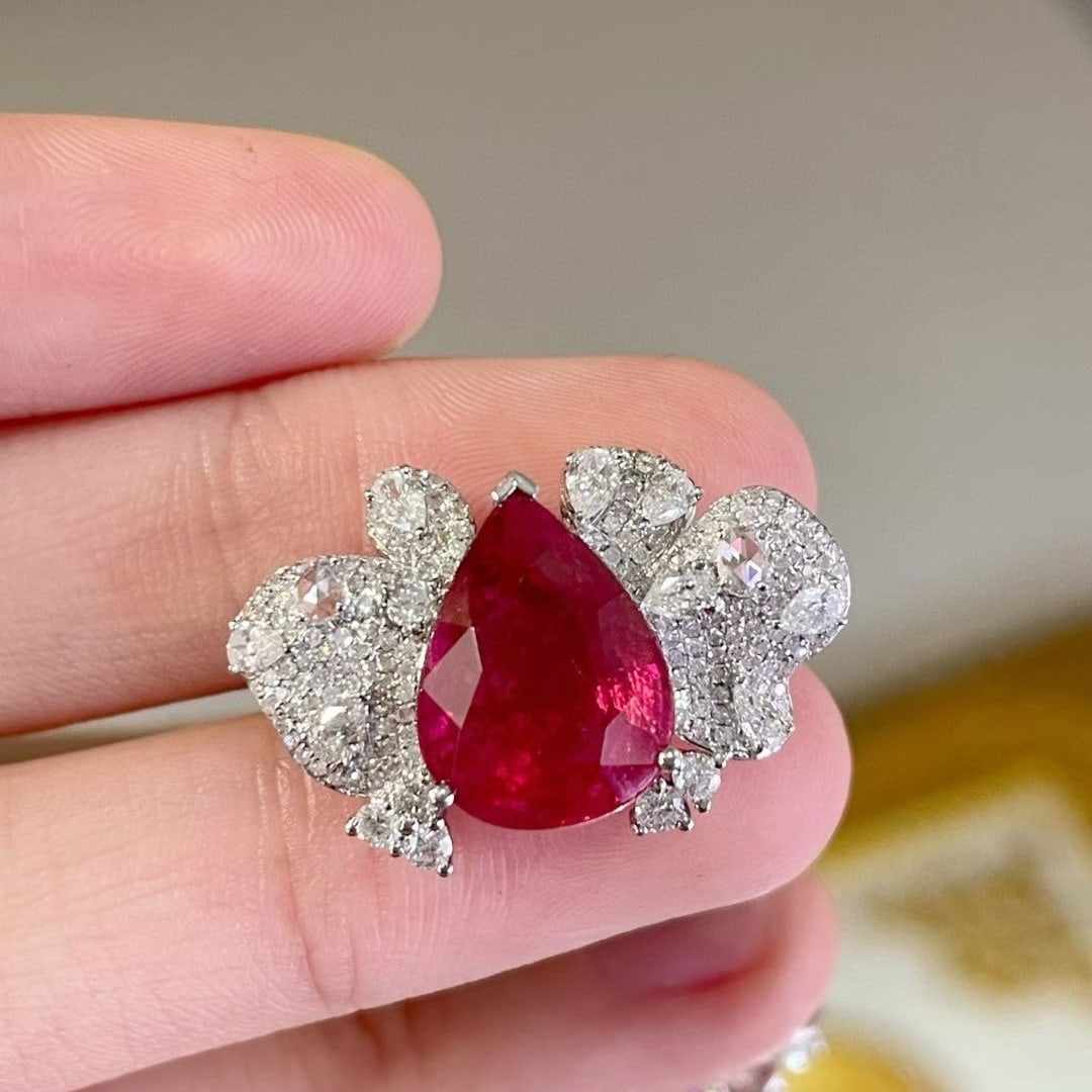 14k Gold 5.6 Ct Natural Tourmaline & Diamond Ring: Ref:231044422 // gold content:14k gold // ring size:7. 25us // // main gemstone:tourmaline // shape:pear // carat weight:5. 6ct // color:red // treatment:natural // // adjacent gemstone 2 : diamond //