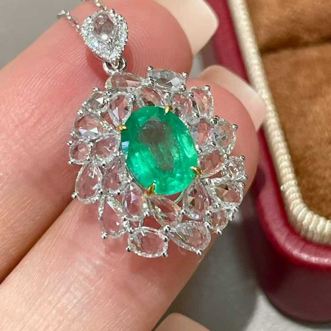 14k Gold 1.22 Ct Natural Emerald & Diamond & Sapphire Pendant( Without Chain ): Ref:231044439 // gold content:14k gold // main gemstone:emerald // shape:oval // carat weight:1. 22ct // color:green // treatment:natural // // adjacent gemstone 2 : diamond // shape:round // clarity