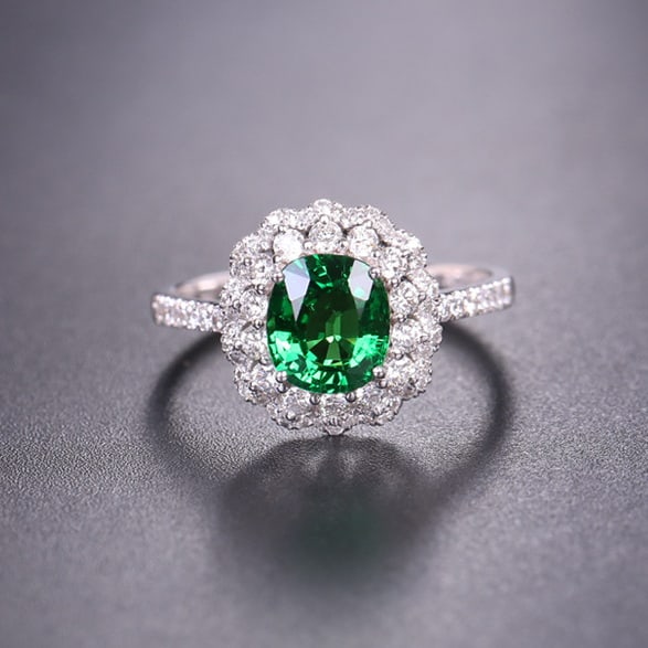 14k Gold 2.12 Ctw Natural Tsavorite & Diamond Ring: Ref:231042397 // gold content:14k gold // ring size:7. 25us // // main gemstone:tsavorite // shape:oval // carat weight:1. 6ct // color:green // treatment:natural // // adjacent gemstone 2 : diamond