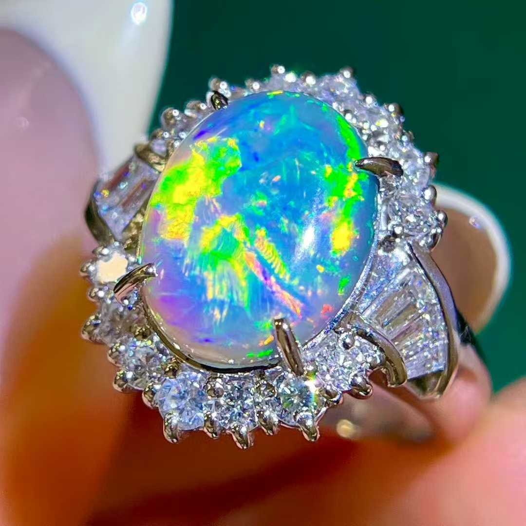 14k Gold 3.40 Ctw Natural Opal & Diamond Ring: Ref:231043073 // gold content:14k gold // ring size:7. 25us // // main gemstone:opal // shape:oval // carat weight:2. 65ct // color:color // treatment:natural // // adjacent gemstone 2 : diamond // sh