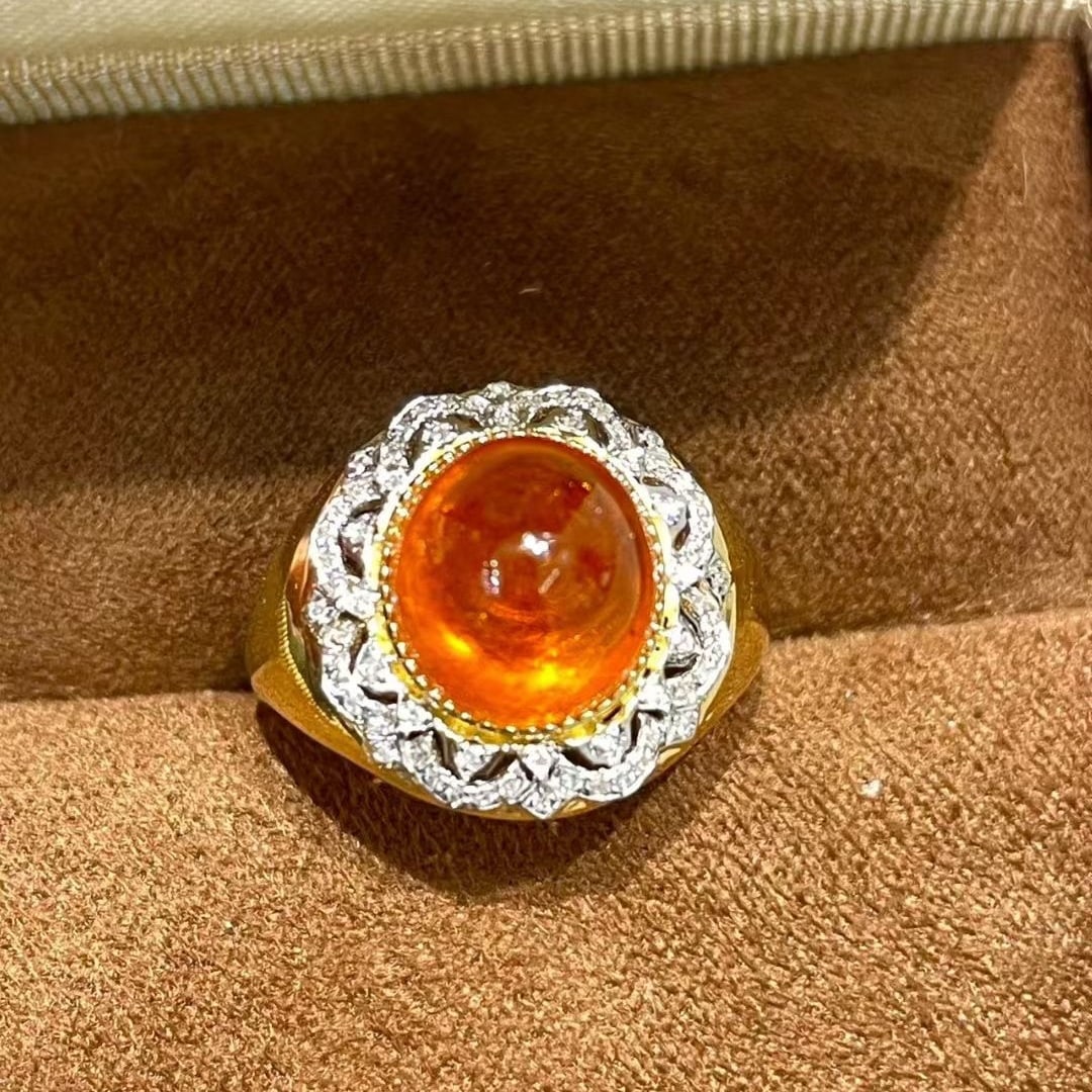 14k Gold 7.7 Ct Natural Spessartine & Diamond Ring: Ref:231043078 // gold content:14k gold // ring size:7. 25us // // main gemstone:spessartine // shape:oval // carat weight:7. 7ct // color:orange // treatment:natural // // adjacent gemstone 2 :