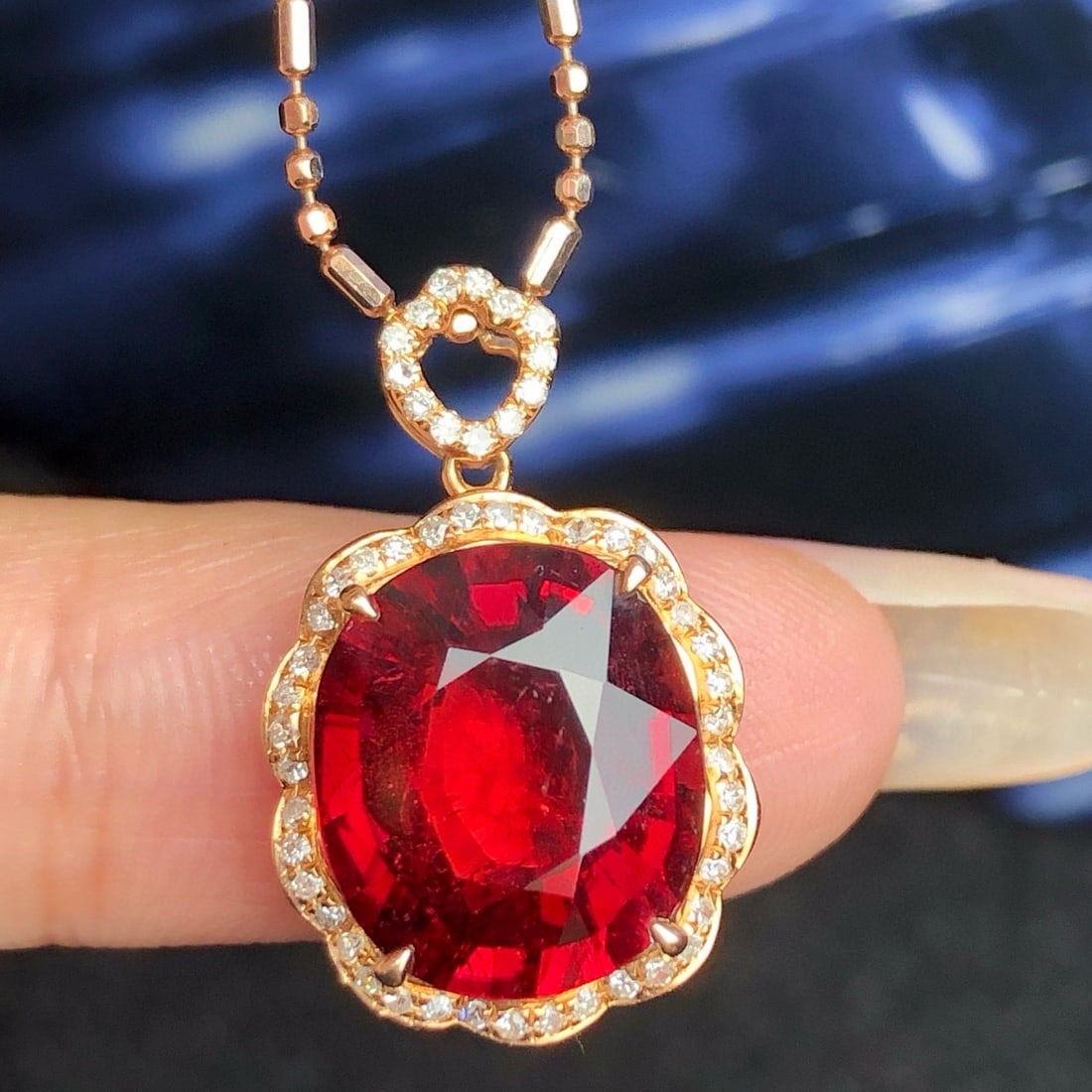 14k Gold 6.45 Ct Natural Tourmaline & Diamond Pendant( Without Chain ): Ref:231043119 // gold content:14k gold // main gemstone:tourmaline // shape:oval // carat weight:6. 45ct // color:red // treatment:natural // // adjacent gemstone 2 : diamond // number of stones:53 //