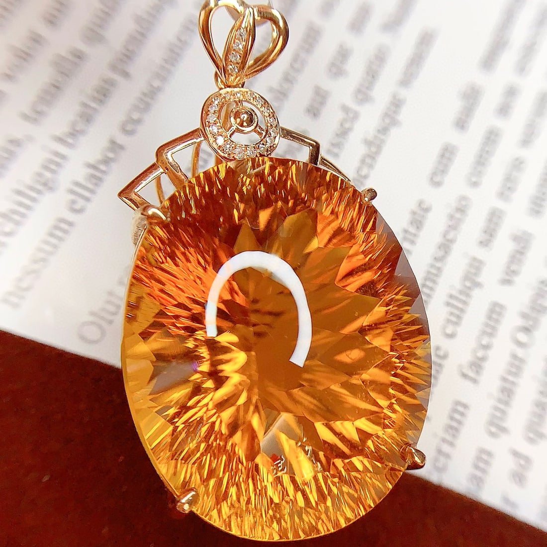 14k Gold 69.65 Ct Natural Citrine & Diamond Pendant( Without Chain ): Ref:231043129 // gold content:14k gold // main gemstone:citrine // shape:oval // carat weight:69. 65ct // color:yellow // treatment:natural // // adjacent gemstone 2 : diamond // number of stones:21