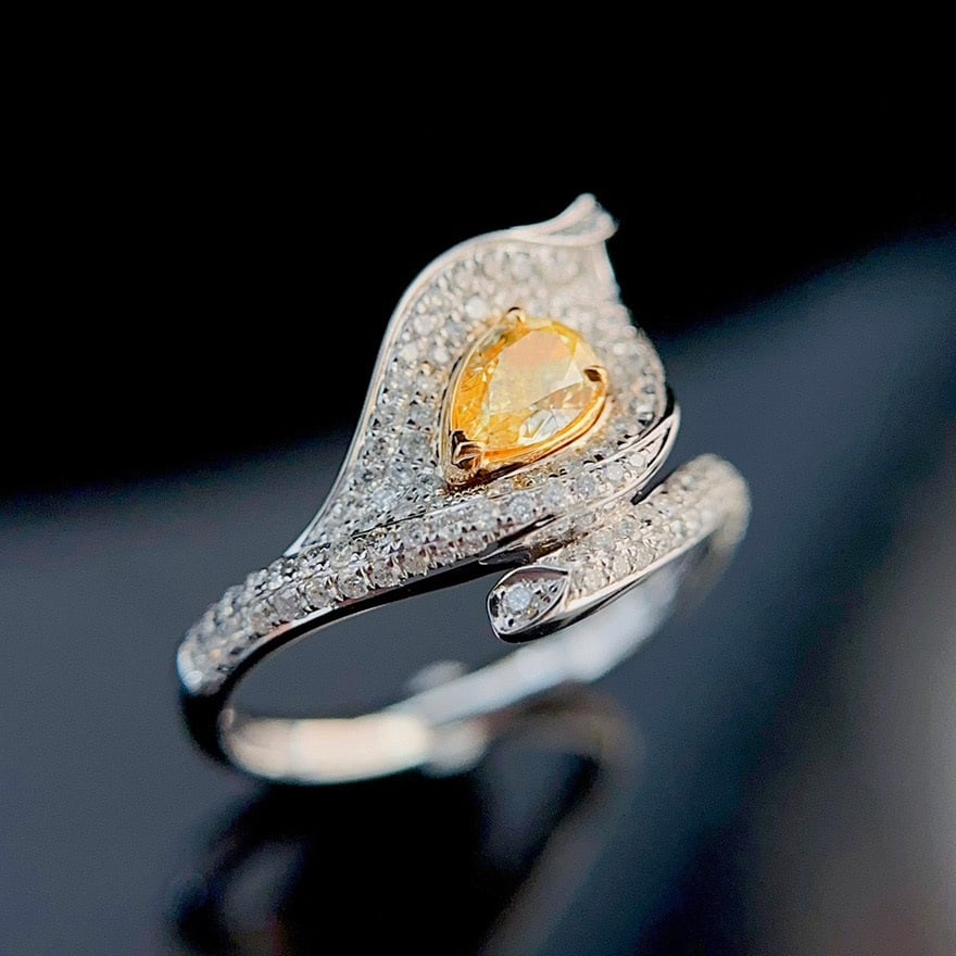 14k Gold 0.70 Ctw Natural Yellow Diamond & Diamond Ring: Ref:231043248 // gold content:14k gold // ring size:7. 25us // // main gemstone:yellow diamond // shape:pear // carat weight:0. 32ct // color:yellow // treatment:natural // // adjacent gemstone 2 :