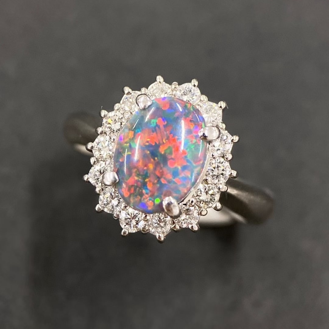 14k Gold 1.57 Ctw Natural Opal & Diamond Ring: Ref:231044122 // gold content:14k gold // ring size:7. 25us // // main gemstone:opal // shape:oval // carat weight:1. 14ct // color:color // treatment:natural // // adjacent gemstone 2 : diamond // sh