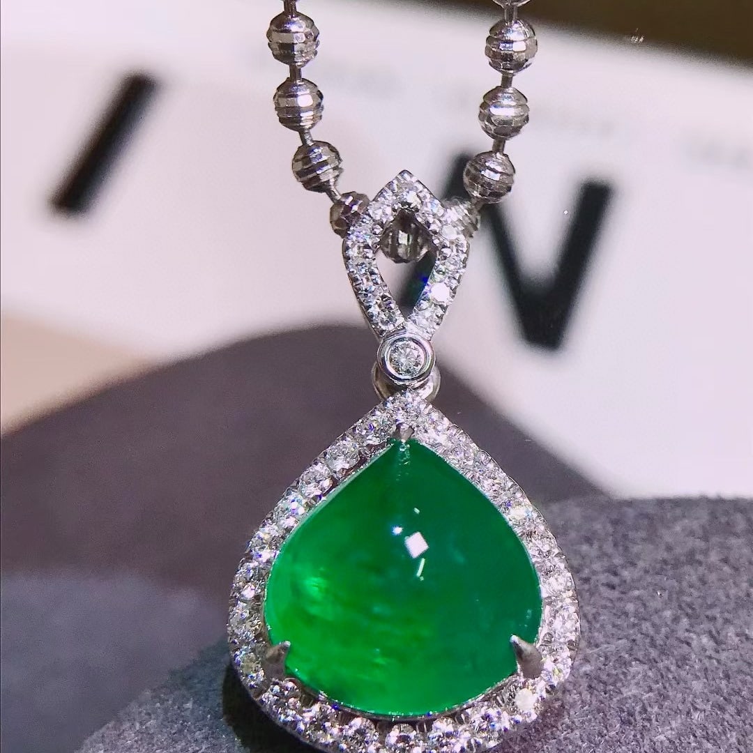 14k Gold 3.7 Ctw Vivid Green Natural Emerald & Diamond Pendant( Without Chain ): Ref:231044134 // gold content:14k gold // main gemstone:emerald // shape:pear // carat weight:3. 3ct // color:vivid green // treatment:natural // // adjacent gemstone 2 : diamond // shape:round //