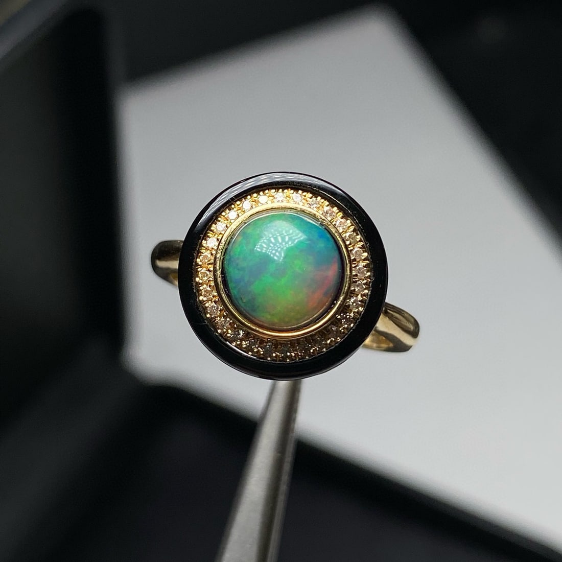 14k Gold 1.09 Ctw Natural Opal & Diamond Ring: Ref:231044221 // gold content:14k gold // ring size:7. 25us // // main gemstone:opal // shape:round // carat weight:1. 00ct // color:color // treatment:natural // cut grade:g // // adjacent gemstone 2