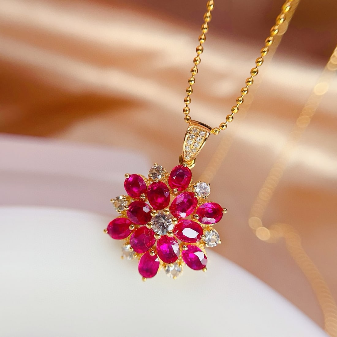 14k Gold 3.05 Ct Natural Ruby & Diamond & Sapphire Pendant( Without Chain ): Ref:231044235 // gold content:14k gold // main gemstone:ruby // shape:oval // carat weight:3. 05ct // color:red // treatment:natural // // adjacent gemstone 2 : diamond // number of stones:10 //
