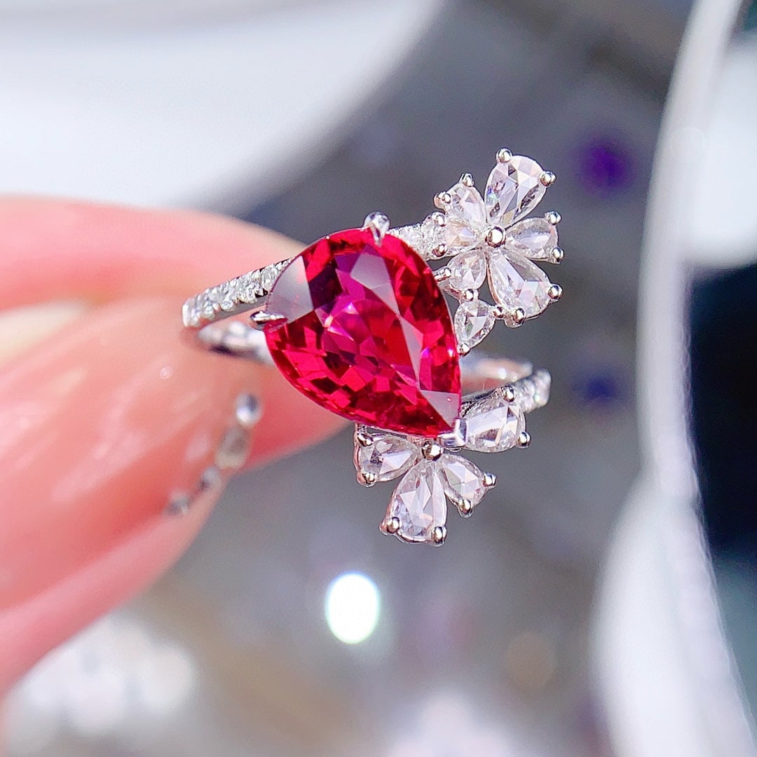 14k Gold 3.95 Ctw Natural Tourmaline & Diamond Ring: Ref:231044290 // gold content:14k gold // ring size:7. 25us // // main gemstone:tourmaline // shape:pear // carat weight:3. 5ct // color:red // treatment:natural // // adjacent gemstone 2 : diamond