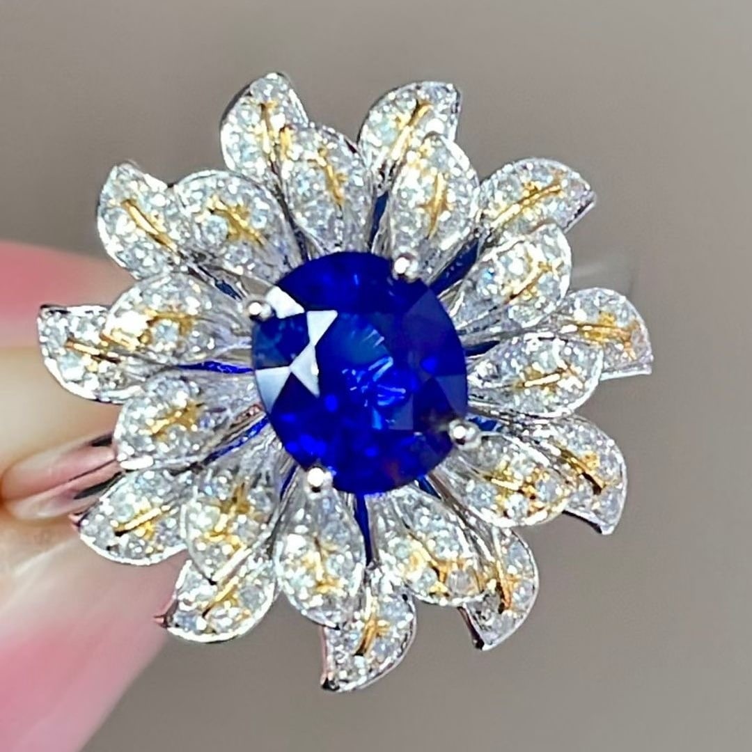 14k Gold 0.9 Ct Natural Sapphire & Diamond Ring: Ref:231044319 // gold content:14k gold // ring size:7. 25us // // main gemstone:sapphire // shape:oval // carat weight:0. 9ct // color:royal blue // treatment:natural // // adjacent gemstone 2 :