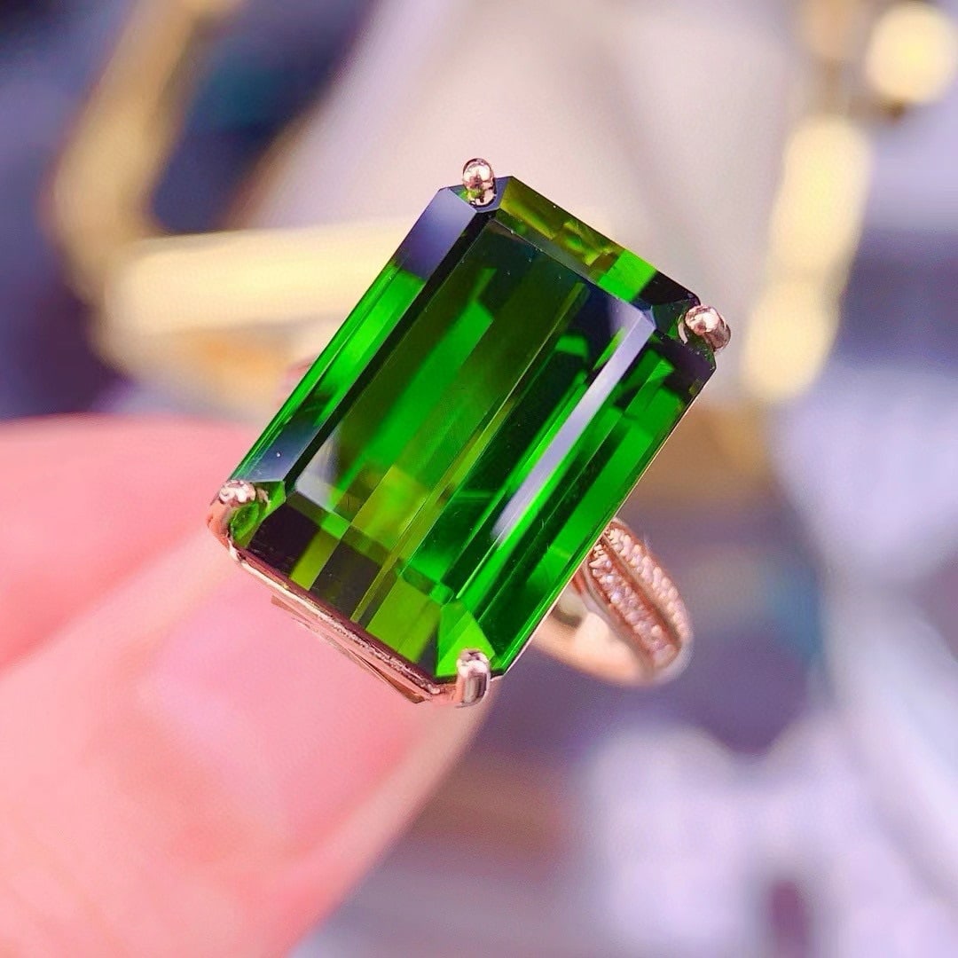14k Gold 15.7 Ct Natural Tourmaline & Diamond Ring: Ref:231044385 // gold content:14k gold // ring size:7. 25us // // main gemstone:tourmaline // shape:octagonal // carat weight:15. 7ct // color:green // treatment:natural // // adjacent gemstone 2 : di