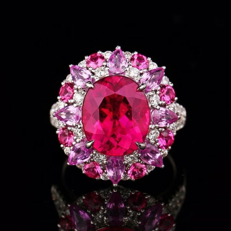 14k Gold 5.49 Ctw Natural Tourmaline & Diamond Ring: Ref:231045012 // gold content:14k gold // ring size:7. 25us // // main gemstone:tourmaline // shape:oval // carat weight:4. 86ct // color:red // treatment:natural // // adjacent gemstone 2 : diamond /