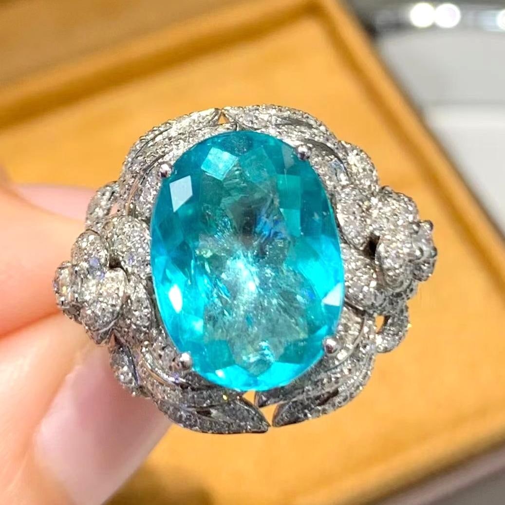 14k Gold 5 Ct Natural Paraiba Tourmaline & Diamond Ring: Ref:231045014 // gold content:14k gold // ring size:7. 25us // // main gemstone:paraiba tourmaline // shape:oval // carat weight:5ct // color:blue // treatment:natural // // adjacent gemstone 2 : diam