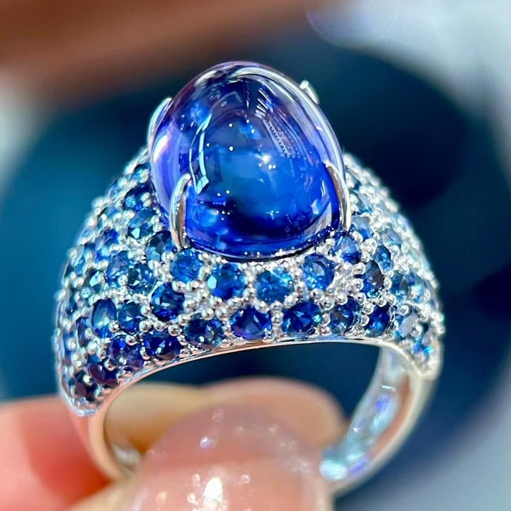 14k Gold 14.01 Ctw Natural Tanzanite & Sapphire Ring: Ref:231045016 // gold content:14k gold // ring size:7. 25us // // main gemstone:tanzanite // shape:oval // carat weight:9. 99ct // color:blue // treatment:natural // // adjacent gemstone 2 : sapphire