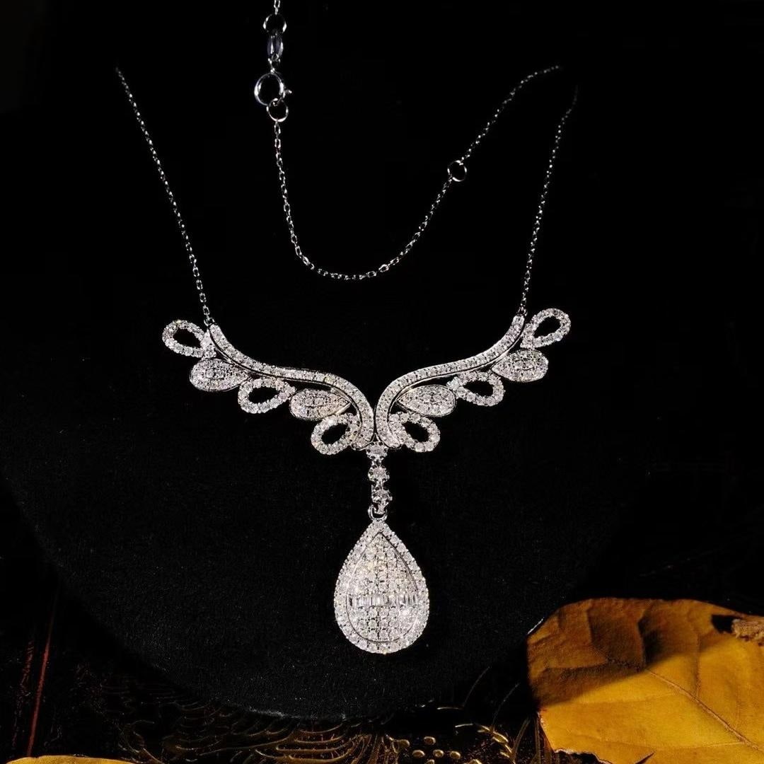 14k Gold 1.88 Ct Natural H Diamond Necklace: Ref:231045032 // gold content:14k gold // main gemstone:diamond // shape:multiply // carat weight:1. 88ct // clarity grade:vs-si // color:h // treatment:natural // Low Estimate: 5500 Condition: New