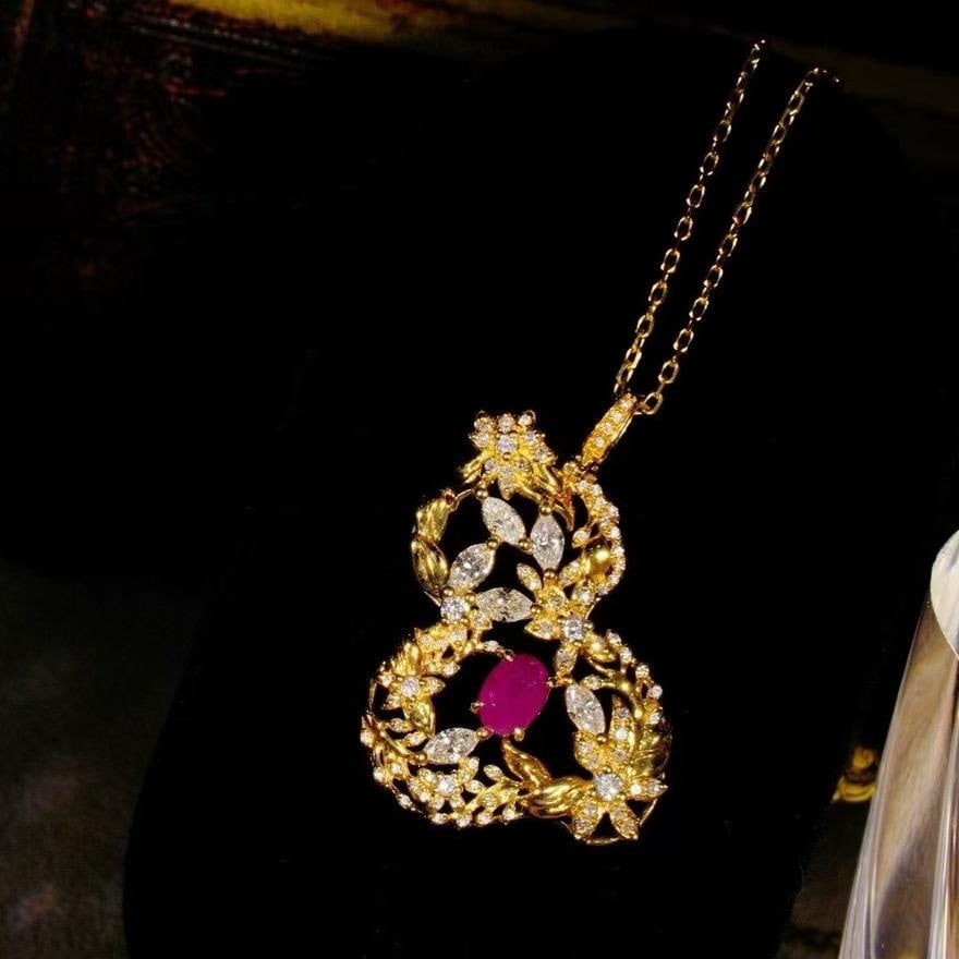 14k Gold 1.28 Ctw Natural Ruby & Diamond Pendant( Without Chain ): Ref:231045035 // gold content:14k gold // main gemstone:ruby // shape:oval // carat weight:0. 52ct // color:red // treatment:natural // // adjacent gemstone 2 : diamond // shape:multiply // carat weig