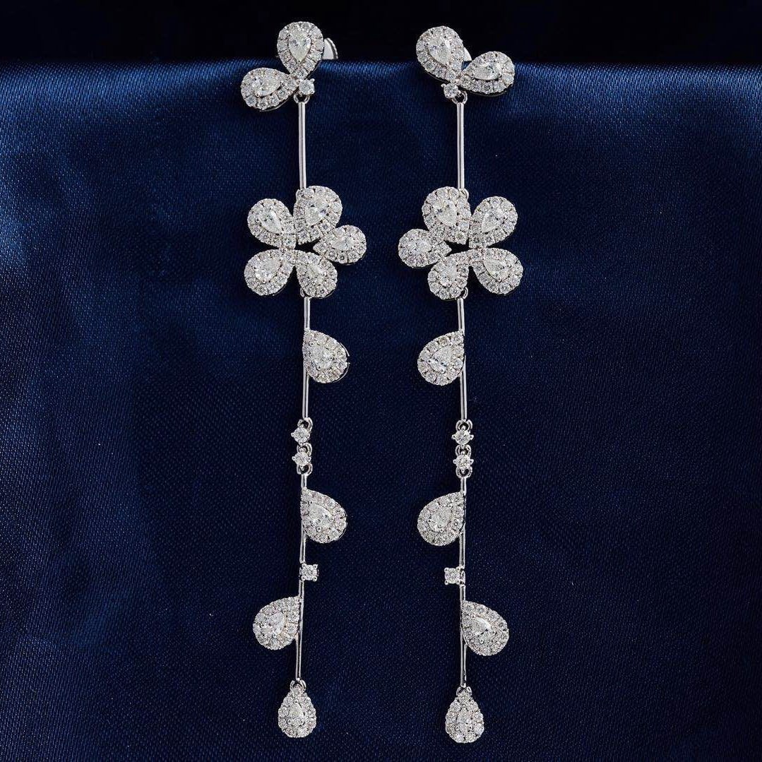 14k Gold 2.68 Ctw Natural H Diamond Earrings: Ref:231045037 // gold content:14k gold // main gemstone:diamond // shape:pear // carat weight:1. 21ct // clarity grade:vs-si // color:h // treatment:natural // // adjacent gemstone 2 : diamond // shap
