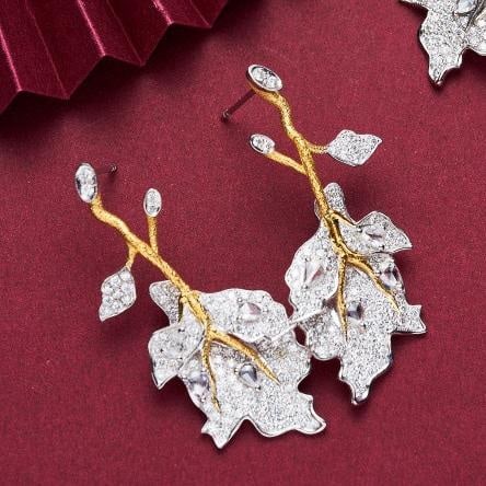 14k Gold 1.65 Ctw Natural H Diamond Earrings: Ref:231045039 // gold content:14k gold // main gemstone:diamond // shape:pear // carat weight:0. 36ct // clarity grade:vs-si // color:h // treatment:natural // // adjacent gemstone 2 : diamond //