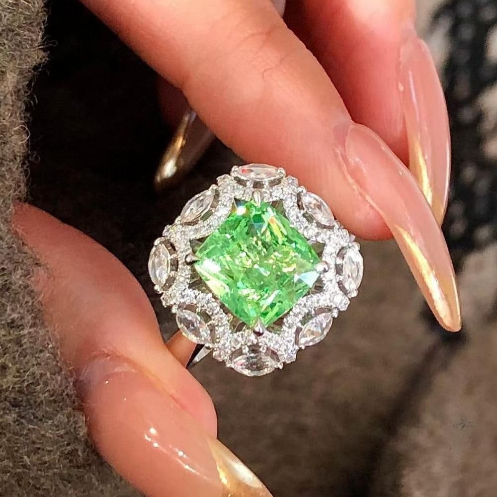 14k Gold 3.64 Ctw Natural Tsavorite & Diamond Ring: Ref:231045048 // gold content:14k gold // ring size:7. 25us // // main gemstone:tsavorite // shape:cushion // carat weight:3. 02ct // color:green // treatment:natural // // adjacent gemstone 2 :