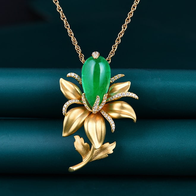 14k Gold 7.57 Ctw Vivid Green Natural Emerald & Diamond Brooch/pendant( Without Chain ): Ref:231045057 // gold content:14k gold // main gemstone:emerald // shape:pear // carat weight:7. 2ct // color:vivid green // treatment:natural // // adjacent gemstone 2 : diamond // number of