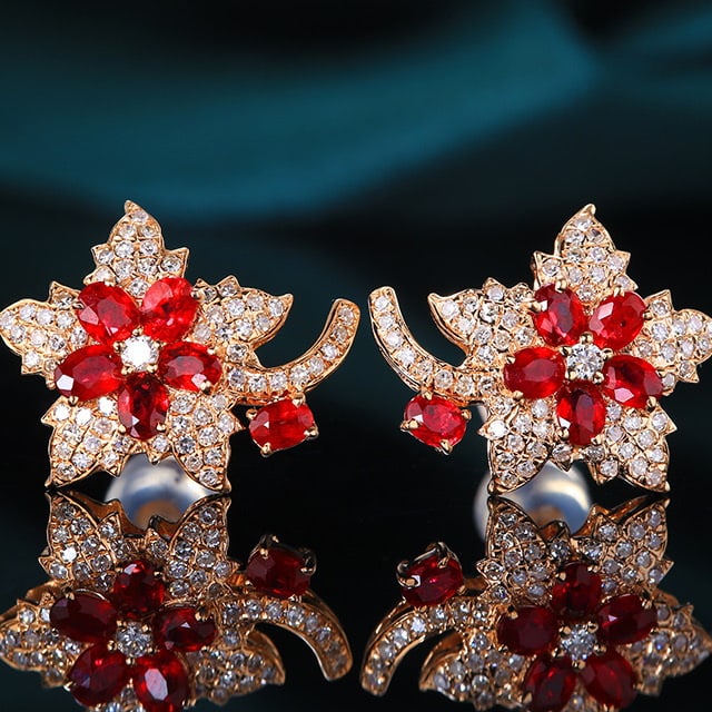 14k Gold 1.62 Ctw Natural Ruby & Diamond Earrings: Ref:231045061 // gold content:14k gold // main gemstone:ruby // shape:oval // carat weight:1. 2ct // color:red // treatment:natural // // adjacent gemstone 2 : diamond // number of stones:128 //
