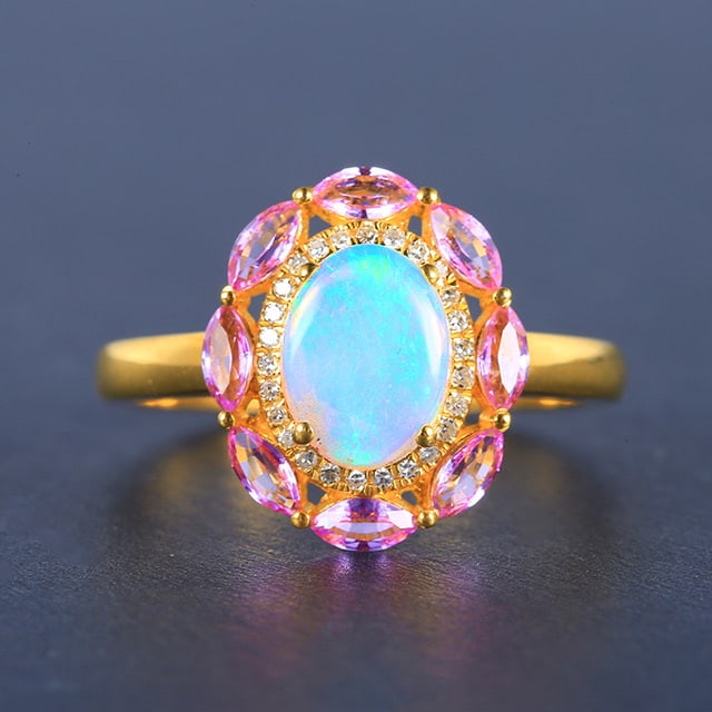14k Gold 0.78 Ctw Natural Opal & Diamond Ring: Ref:231045078 // gold content:14k gold // ring size:7. 25us // // main gemstone:opal // shape:oval // carat weight:0. 7ct // color:white // treatment:natural // // adjacent gemstone 2 : diamond // num