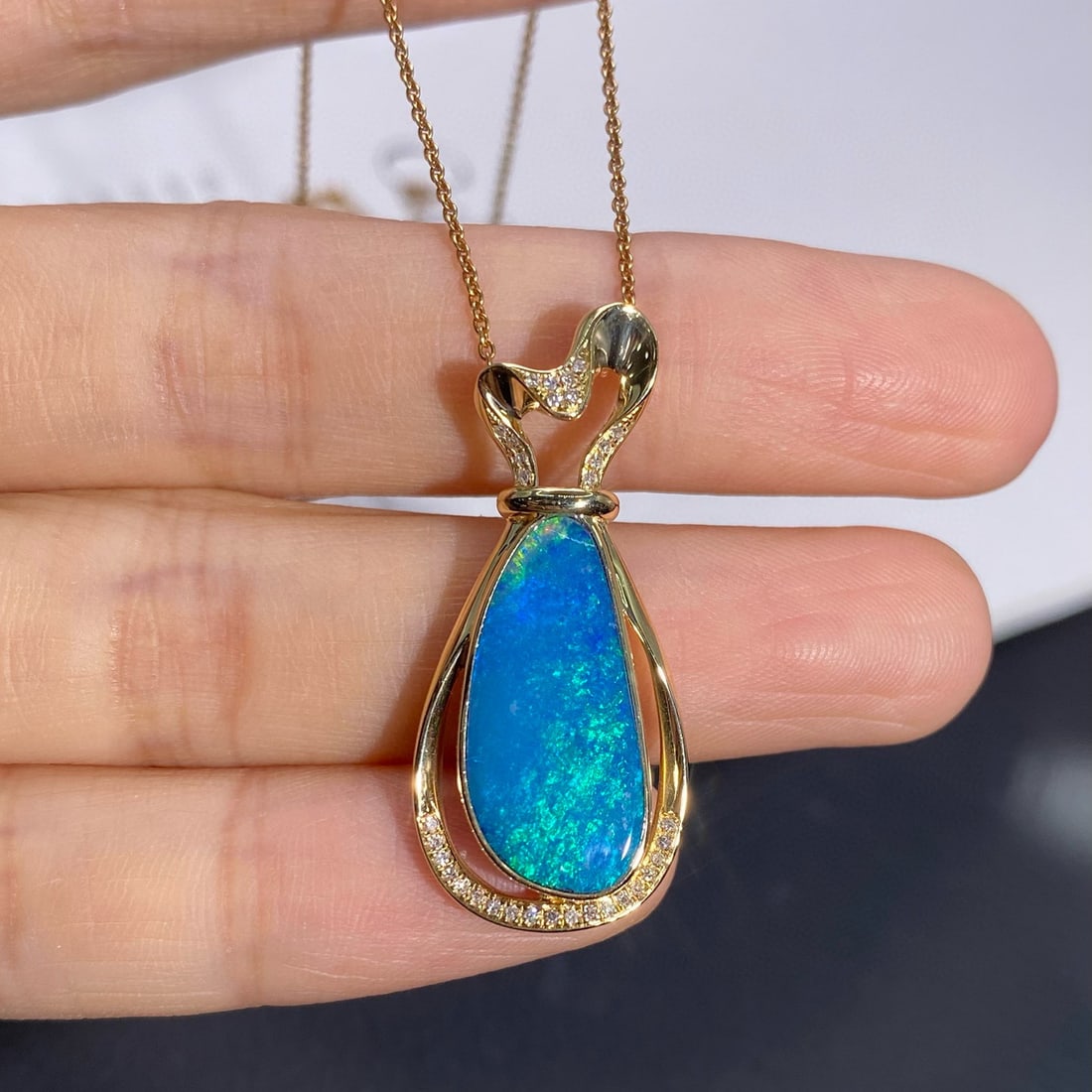 14k Gold 4.23 Ctw Natural Opal & Diamond Pendant( Without Chain ): Ref:231045163 // gold content:14k gold // main gemstone:opal // shape:other // carat weight:4. 13ct // color:blue // treatment:natural // // adjacent gemstone 2 : diamond // shape:round // carat weigh