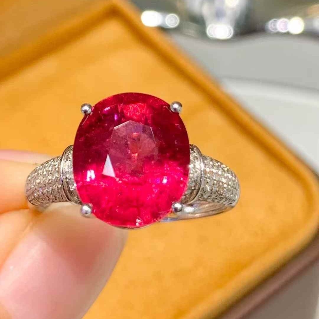 14k Gold 5.8 Ct Natural Tourmaline & Diamond Ring: Ref:231045167 // gold content:14k gold // ring size:7. 25us // // main gemstone:tourmaline // shape:oval // carat weight:5. 8ct // color:red // treatment:natural // // adjacent gemstone 2 : diamond