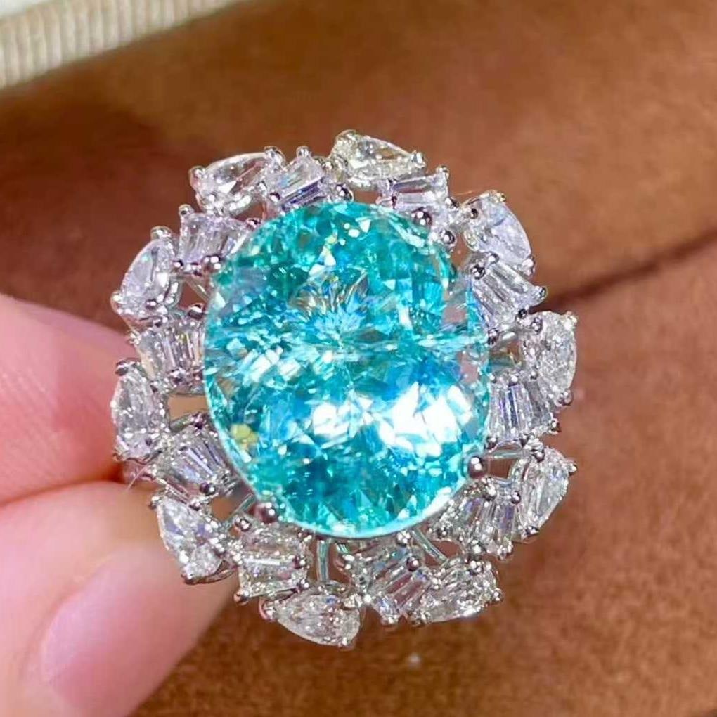 14k Gold 6.71 Ctw Natural Paraiba Tourmaline & Diamond Ring/pendant( Without Chain ): Ref:231045170 // gold content:14k gold // ring size:7. 25us // // main gemstone:paraiba tourmaline // shape:oval // carat weight:5. 51ct // color:neon blue // treatment:natural // // adjacent gemstone