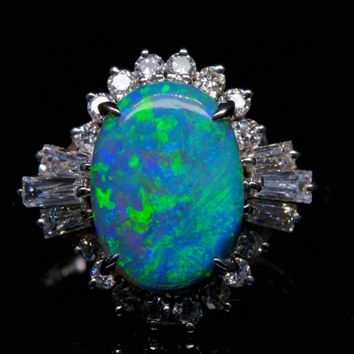 14k Gold 2.74 Ctw Natural Opal & Diamond Ring: Ref:231045198 // gold content:14k gold // ring size:7. 25us // // main gemstone:opal // shape:oval // carat weight:2. 02ct // color:blue-green // treatment:natural // // adjacent gemstone 2 : diamond