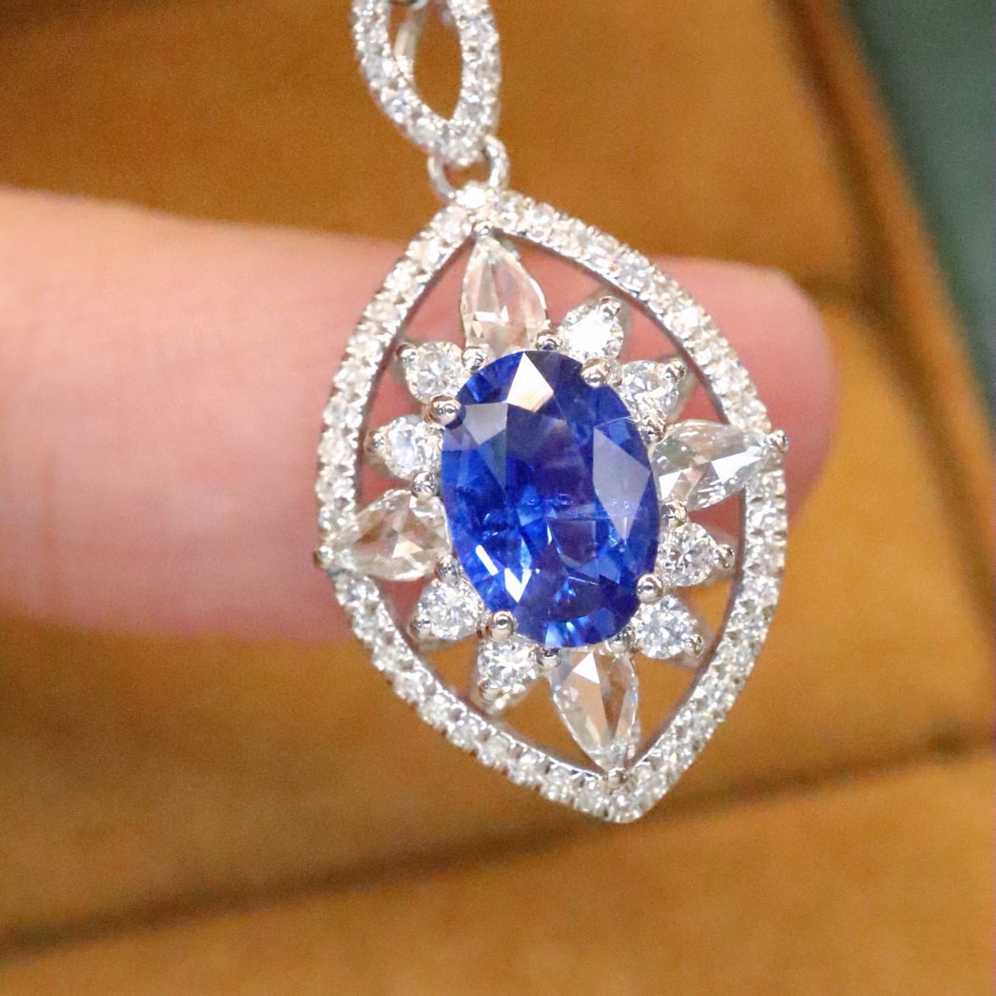 14k Gold 1.53 Ctw Natural Sapphire & Diamond Pendant( Without Chain ): Ref:231045216 // gold content:14k gold // main gemstone:sapphire // shape:oval // carat weight:1. 06ct // color:blue // treatment:natural // // adjacent gemstone 2 : diamond // number of stones:68 //