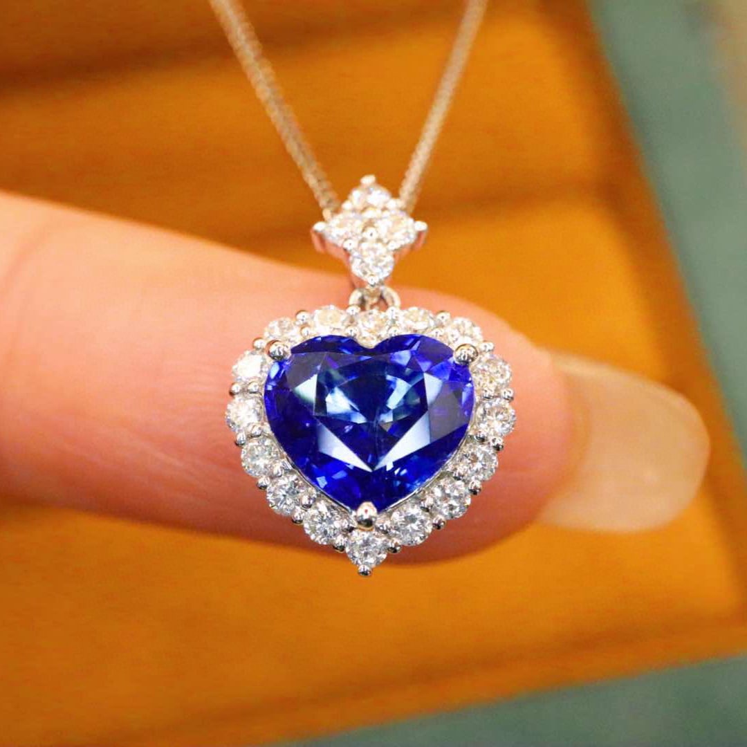14k Gold 2.45 Ctw Natural Sapphire & Diamond Pendant( Without Chain ): Ref:231045256 // gold content:14k gold // main gemstone:sapphire // shape:heart // carat weight:2. 01ct // color:blue // treatment:natural // // adjacent gemstone 2 : diamond // number of stones:20
