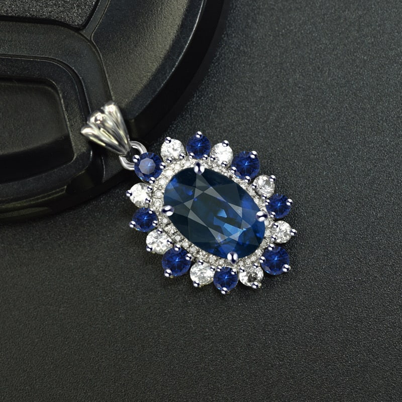 14k Gold 4.32 Ctw Natural Sapphire & Sapphire Pendant( Without Chain ): Ref:231046010 // gold content:14k gold // main gemstone:sapphire // shape:oval // carat weight:3. 91ct // color:blue // treatment:natural // // adjacent gemstone 2 : sapphire // shape:round // carat