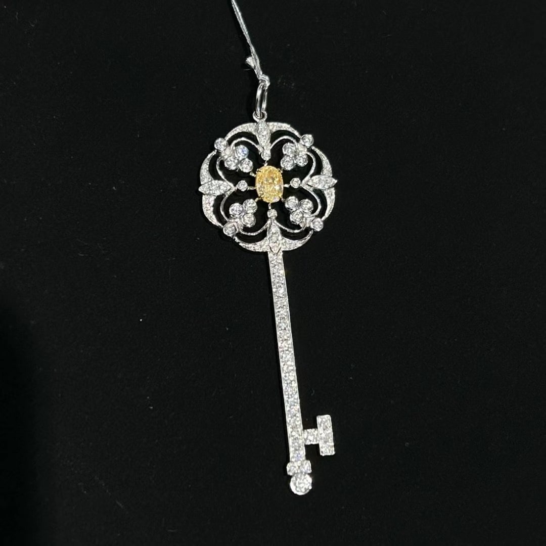 14k Gold 1.26 Ctw Natural Yellow Diamond & Diamond Pendant( Without Chain ): Ref:231046015 // gold content:14k gold // main gemstone:yellow diamond // shape:oval // carat weight:0. 51ct // color:yellow // treatment:natural // // adjacent gemstone 2 : diamond // shape:round //