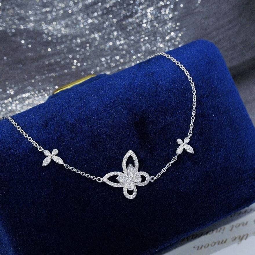 14k Gold 0.47 Ct Natural H Diamond & Butterfly Bracelet: Ref:231046019 // gold content:14k gold // main gemstone:diamond // shape:round // carat weight:0. 47ct // clarity grade:vs-si // color:h // treatment:natural // cut grade:g // High Estimate: 3300 Low