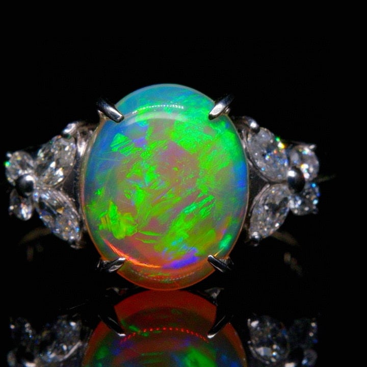14k Gold 2.51 Ctw Natural Opal & Diamond Ring: Ref:231046052 // gold content:14k gold // ring size:7. 25us // // main gemstone:opal // shape:oval // carat weight:2. 12ct // color:color // treatment:natural // // adjacent gemstone 2 : diamond //