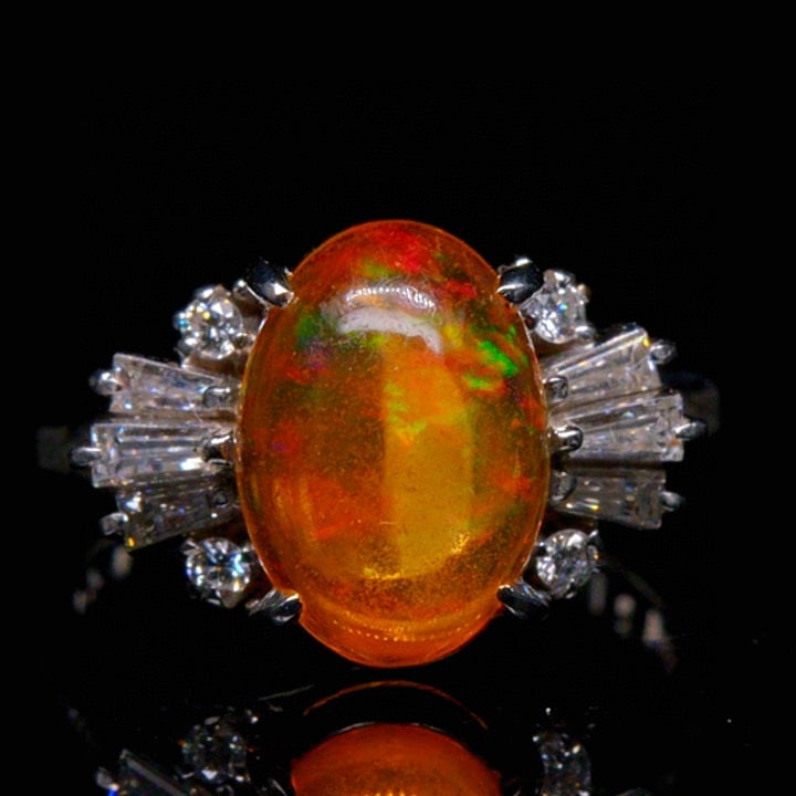 14k Gold 2.53 Ctw Natural Opal & Diamond Ring: Ref:231046053 // gold content:14k gold // ring size:7. 25us // // main gemstone:opal // shape:oval // carat weight:2. 13ct // color:orange // treatment:natural // // adjacent gemstone 2 : diamond // s