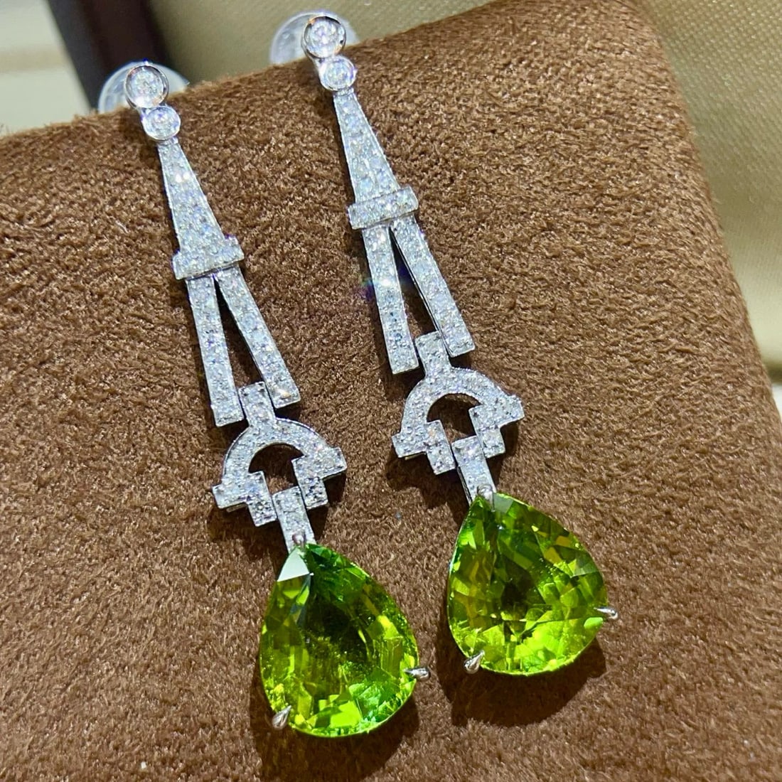 14k Gold 6.19 Ctw Natural Tourmaline & Diamond Earrings: Ref:231046075 // gold content:14k gold // main gemstone:tourmaline // shape:pear // carat weight:5. 90ct // color:green // treatment:natural // // adjacent gemstone 2 : diamond // shape:round //
