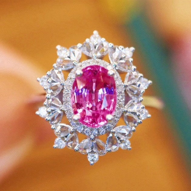 14k Gold 1.75 Ctw Natural Padparadscha Sapphire & Diamond Ring: Ref:231046100 // gold content:14k gold // ring size:7. 25us // // main gemstone:padparadscha sapphire // shape:oval // carat weight:1. 28ct // color:orangish pink // treatment:natural // // adjacent