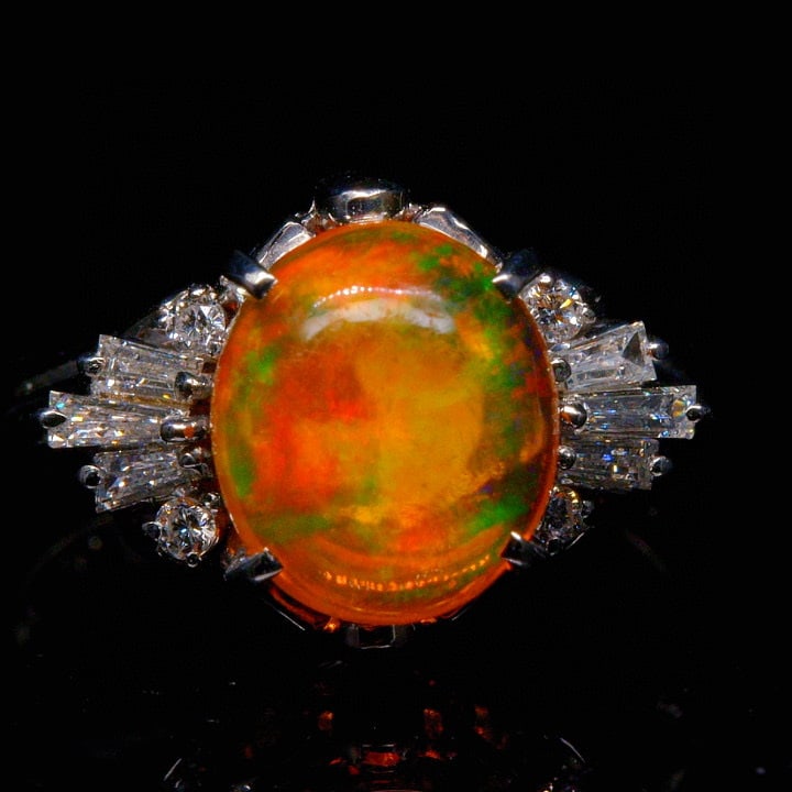14k Gold 2.35 Ctw Natural Opal & Diamond Ring: Ref:231046166 // gold content:14k gold // ring size:7. 25us // // main gemstone:opal // shape:oval // carat weight:2. 09ct // color:orange // treatment:natural // // adjacent gemstone 2 : diamond // s