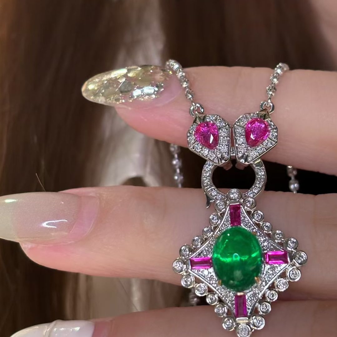 14k Gold 2.4 Ct Vivid Green Natural Emerald & Diamond Pendant( Without Chain ): Ref:231046205 // gold content:14k gold // main gemstone:emerald // shape:oval // carat weight:2. 4ct // color:vivid green // treatment:natural // // adjacent gemstone 2 : diamond // shape:round //