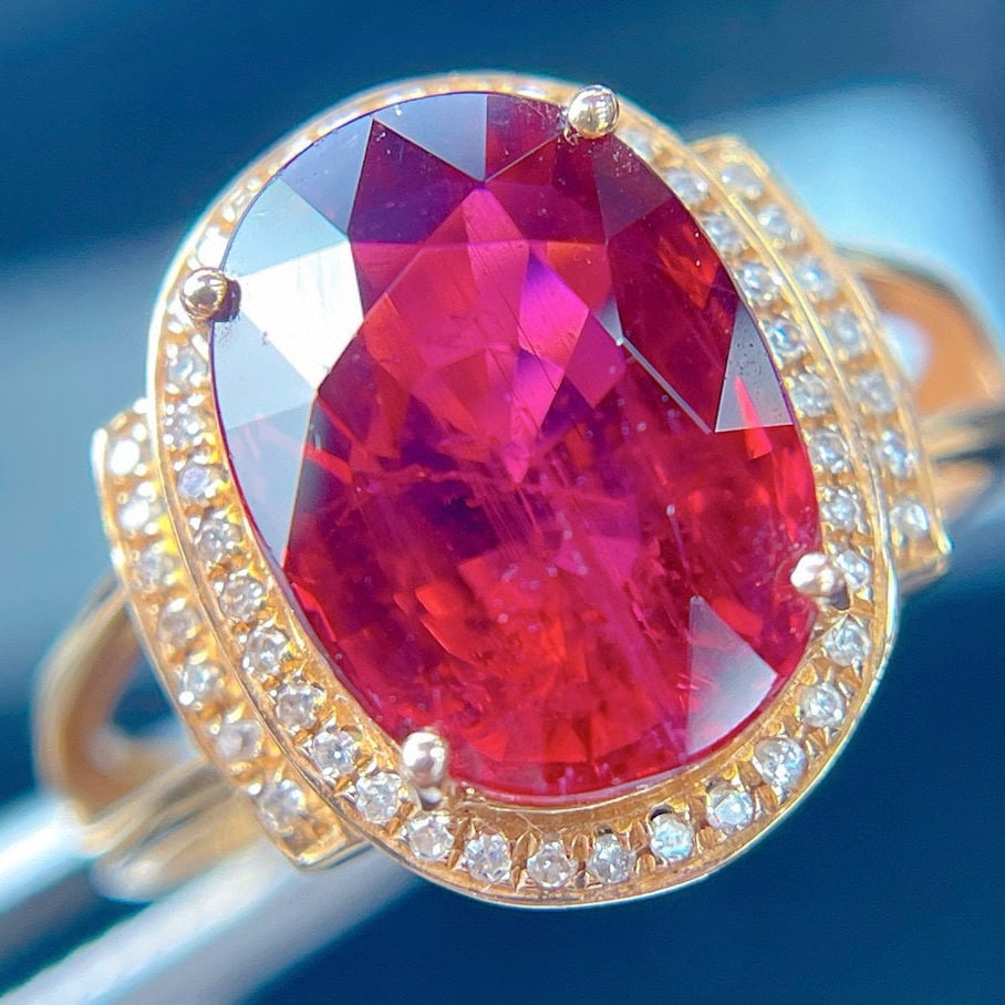 14k Gold 6.8 Ct Natural Tourmaline & Diamond Ring: Ref:231046226 // gold content:14k gold // ring size:7. 25us // // main gemstone:tourmaline // shape:oval // carat weight:6. 8ct // color:red // treatment:natural // // adjacent gemstone 2 : diamond //