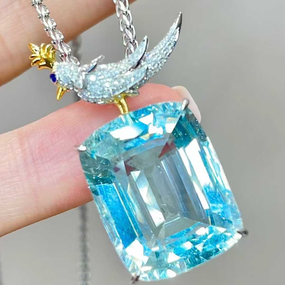 14k Gold 19 Ct Natural Aquamarine & Diamond Pendant( Without Chain ): Ref:231046254 // gold content:14k gold // main gemstone:aquamarine // shape:cushion // carat weight:19ct // color:blue // treatment:natural // // adjacent gemstone 2 : diamond // shape:round //