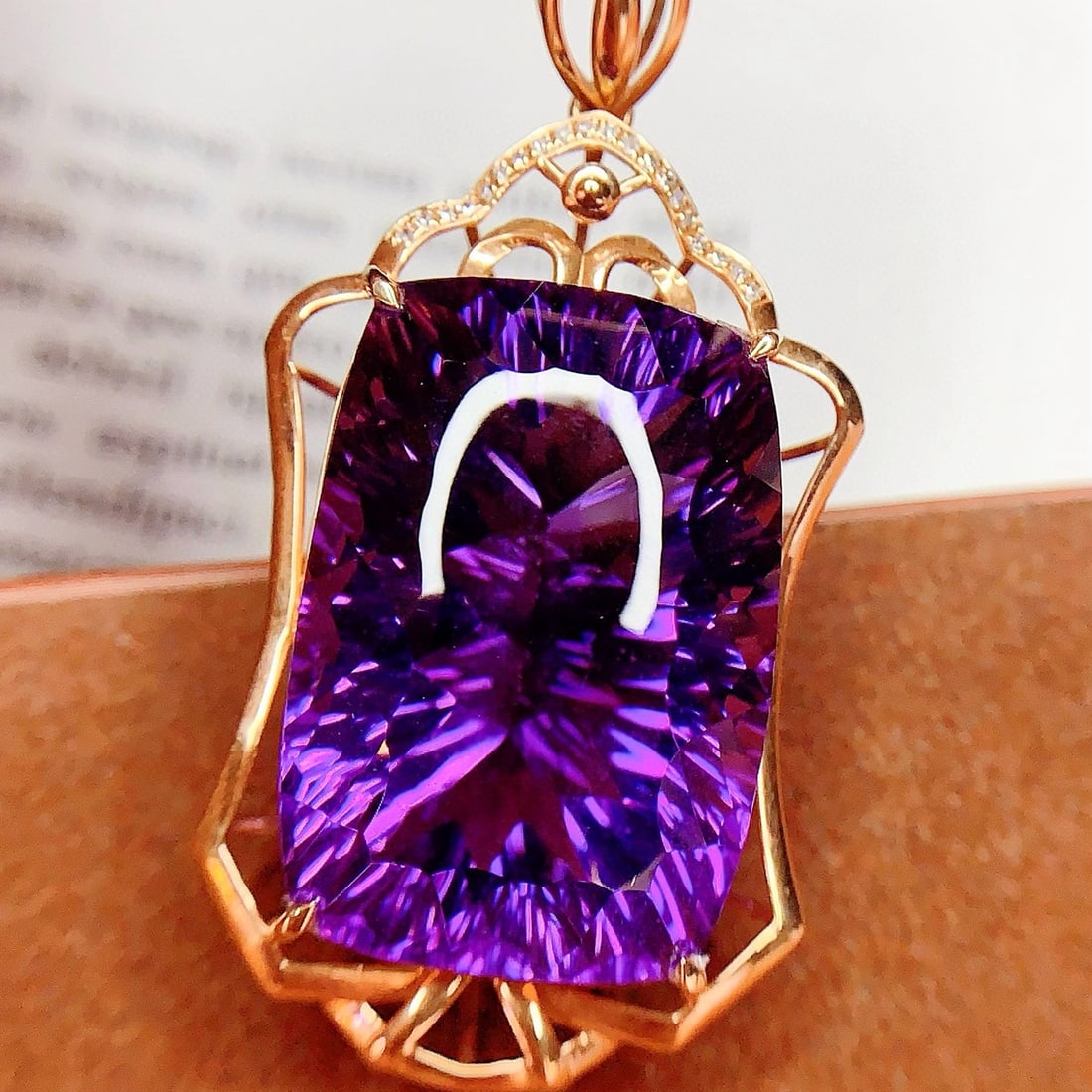 14k Gold 41.4 Ct Natural Amethyst & Diamond Pendant( Without Chain ): Ref:231046301 // gold content:14k gold // main gemstone:amethyst // shape:cushion // carat weight:41. 4ct // color:purple // treatment:natural // // adjacent gemstone 2 : diamond // number of