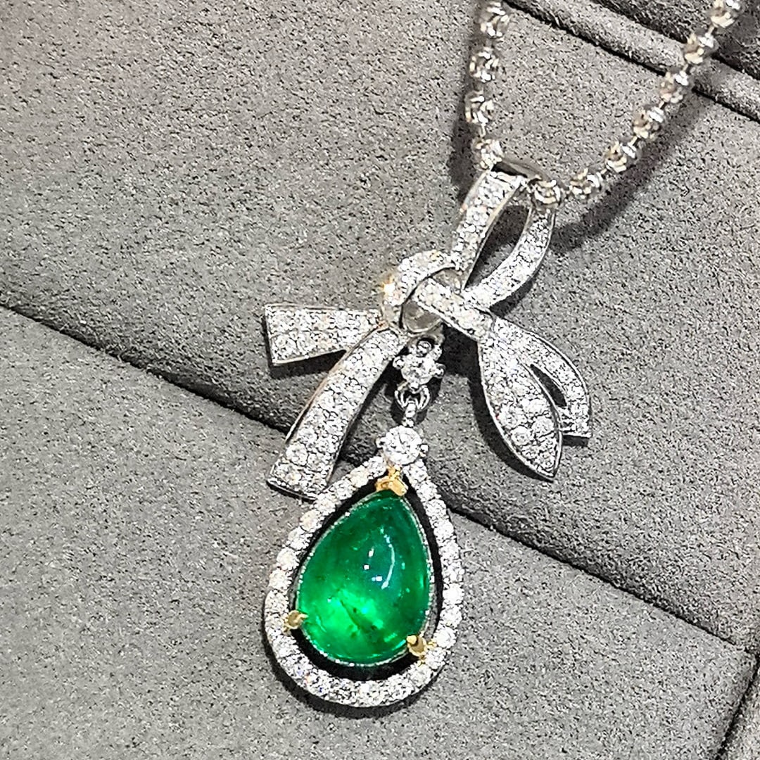 14k Gold 2.45 Ctw Vivid Green Natural Emerald & Diamond Pendant( Without Chain ): Ref:231046321 // gold content:14k gold // main gemstone:emerald // shape:pear // carat weight:1. 89ct // color:vivid green // treatment:natural // // adjacent gemstone 2 : diamond // shape:round //