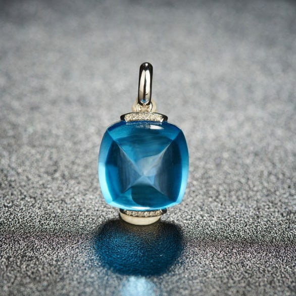 14k Gold 22 Ct Natural Topaz & Diamond Pendant( Without Chain ): Ref:231046332 // gold content:14k gold // main gemstone:topaz // shape:suger-loaf // carat weight:22ct // color:blue // treatment:natural // // adjacent gemstone 2 : diamond // shape:round // clarity