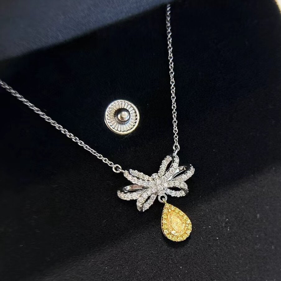 14k Gold 1.04 Ctw Natural Yellow Diamond & Diamond Necklace: Ref:231046340 // gold content:14k gold // main gemstone:yellow diamond // shape:pear // carat weight:0. 54ct // color:yellow // treatment:natural // // adjacent gemstone 2 : diamond // shape:round //